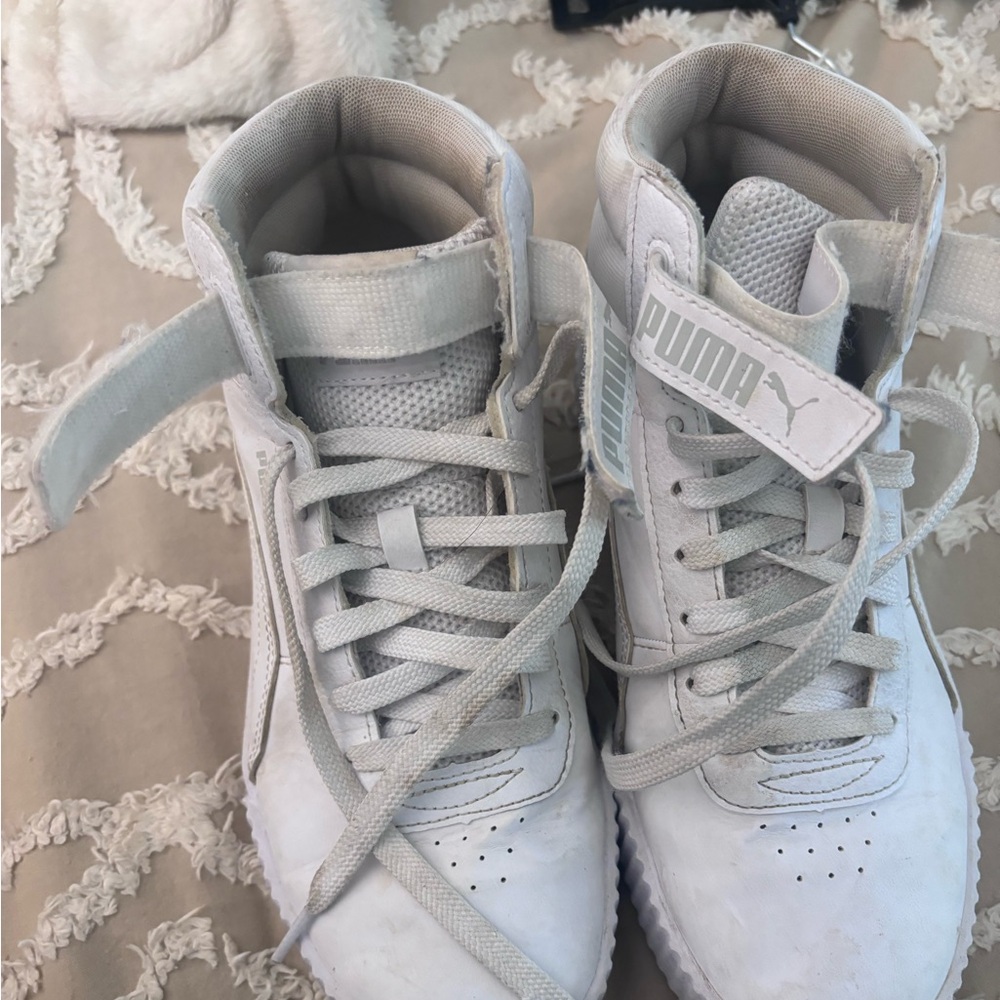 White puma high tops